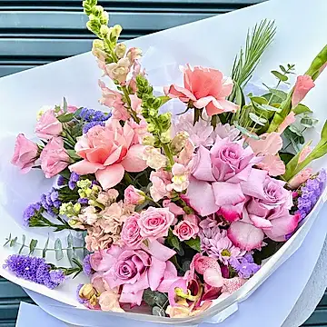 colourful pastel roses and seasonal flower bouquet