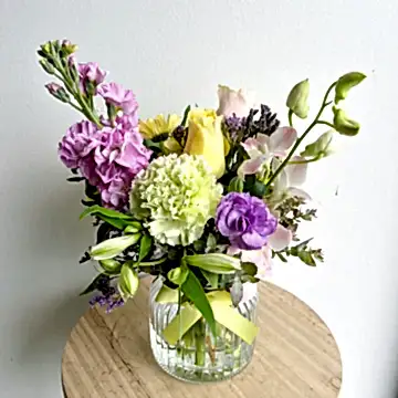 colourful flower arrangement in a glass vase