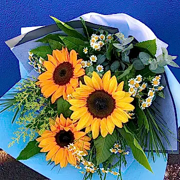 Australia grown sunflowers and seasonal flowers in a bouquet